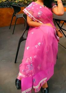 Elegant Pink Saree with Delicate Details
