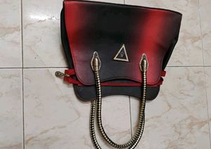 Stylish Handbag with Snake Handle Design