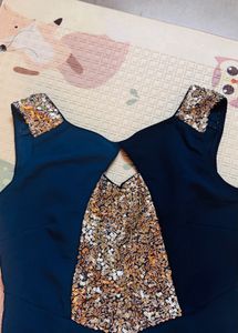 Stylish Teal Jumpsuit with Gold Embellishment
