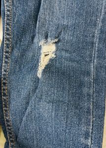 Ripped Blue Denim Jeans