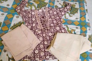 Maroon Floral short Kurta with cream Trousers