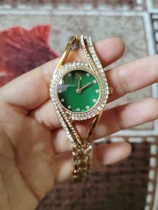 Elegant Gold Watch with Green Dial