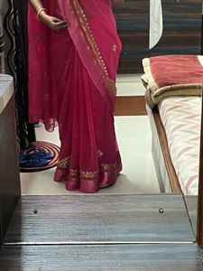 Elegant Pink Saree with Golden Detailing