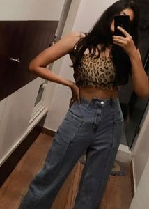 Flared distressed blue denim jean bottoms