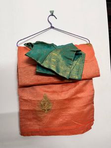 Orange Saree with Teal Blouse
