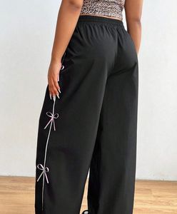 pink bow wide leg track pants