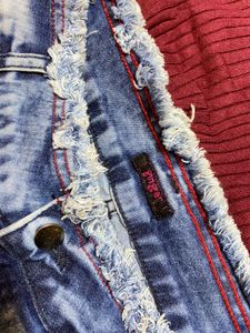Ripped High-Waisted Jeans
