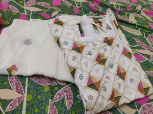 Used white embroided stitched salwar
