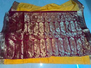 Vibrant Yellow Silk Saree with Ornate Border