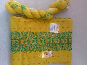 Yellow Cotton dress material with Green Embroidery