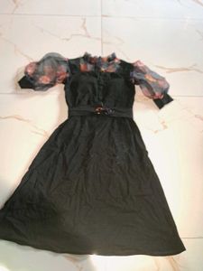 Elegant Black Dress with Floral Sleeves