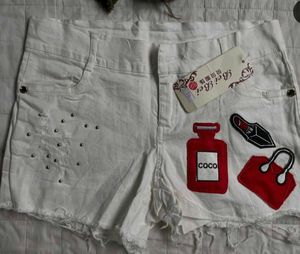 White Denim Shorts with Embellishments