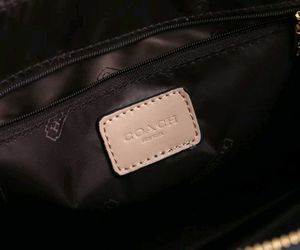 COACH**12A QUALITY HANDBAG* AT OFFER PRICE