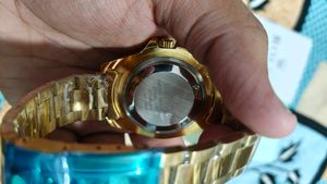 Luxury Gold &amp; Green Rolex Watch