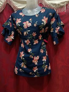 It Is Jean Top With Blue Floral Design.
