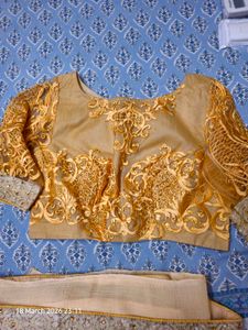 Elegant Peach Saree with stitched blouse