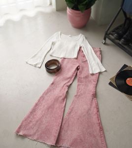 Trendy Bell Bottom Jeans + White Top