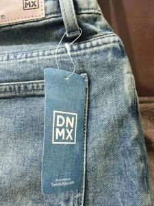 Distressed Blue Denim Jeans