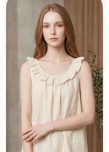 Chic Cream Ruffled Top with Bow Detail