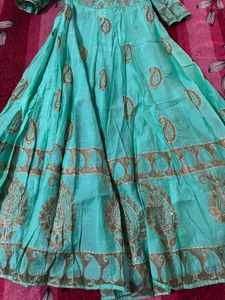 Beautiful Teal Ethnic Gown with Gold Print know an