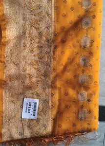 Elegant Yellow Saree with Golden Accents
