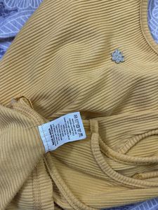 yellow/mustard crop top
