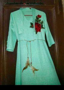 Beautiful Mint Green Gown with Floral Embroidery