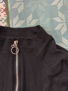 Black Zip-Up Jacket with White Piping