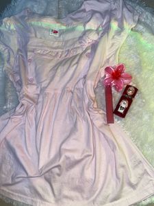 A cute pink baby doll top