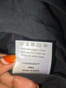 a black casual women’s top from Papaya weekend
