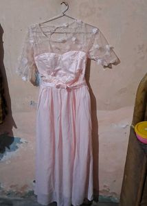 selling this peach floral tulle gown.