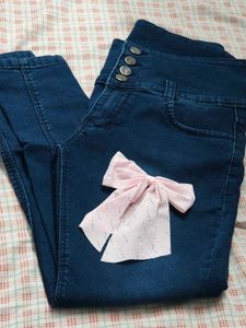 High-Waisted Dark Wash Jeans with Button Detail