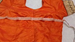 Vibrant Orange Embellished Lehenga Choli