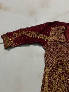 Exquisite Maroon &amp; Gold Embellished Lehenga Choli