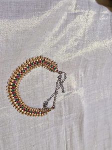 Elegant Gold Tone Necklace with Red &amp; Green Stones