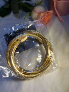 Set of Elegant Gold Tone Bracelets