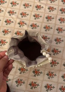 Elegant Pearl Embellished Potli Bag