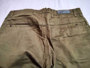 olive green or subtle brown shade pant of 32 size
