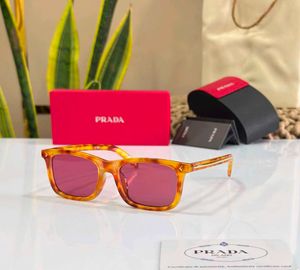 Prada Tortoiseshell Sunglasses with Pink Lenses