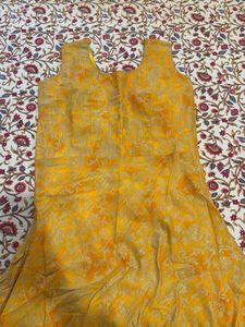 Ethnic yellow gown with shrug and dupatta