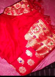 Designer Purple Saree with Orange Blouse