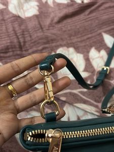 Allen Solly Green Crossbody Bag with Deer Emblem