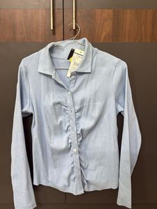 powder blue shirt