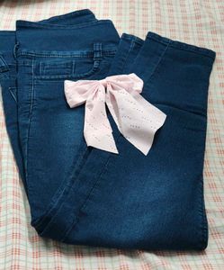 High-Waisted Dark Wash Jeans with Button Detail