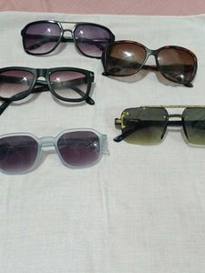 Assorted Sunglasses Lot sat of five , with 3laer c