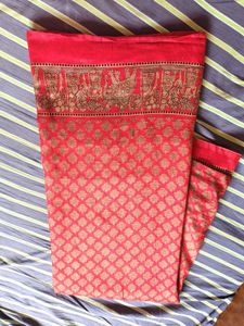 Vibrant Red Saree with Intricate Gold Print
