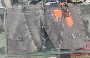 Distressed Gray Denim Jeans
