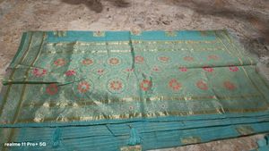 Beautiful Teal Saree with Gold Border