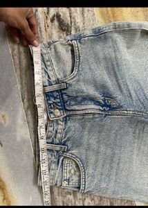 Distressed Light Wash Denim Jeans