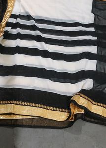 Designer Black And White Saree With Golden Border